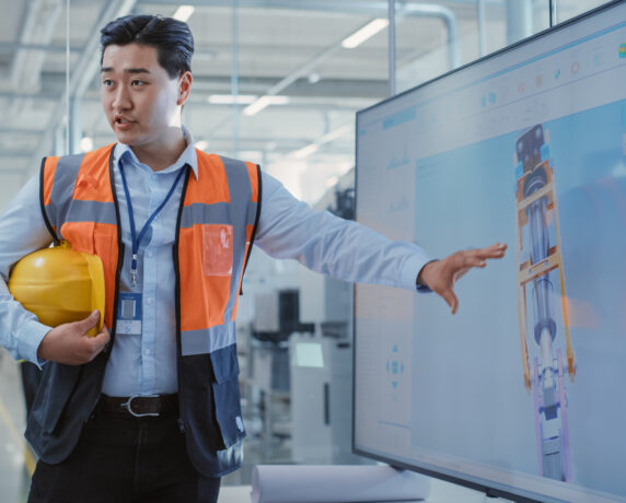 Engineer reviewing technical specifications for product innovation.