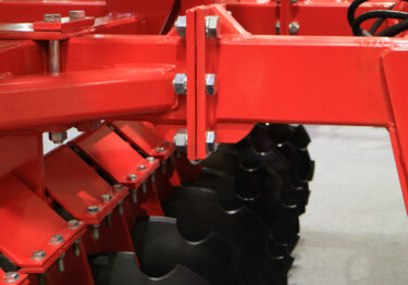 Close-up of bolted joint in mechanical assembly under inspection.