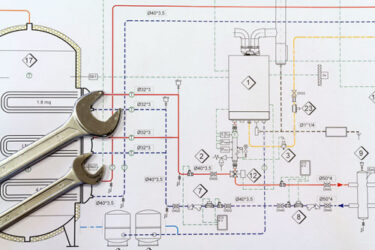 Engineer designing integrated systems for complex engineering solutions.
